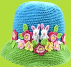 Hand and Heart Turquoise Bunnies and Flowers Hat 