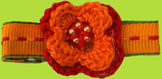 Childrens Red/Orange Crocheted Flower Alligator Clip 