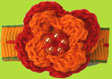 Childrens Red/Orange Crocheted Flower Snap Clip 