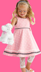 le top Romance pink polka dot dress