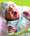 Baby in Pinwheel Newborn Clothing