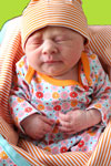 Baby in Sorbetti Newborn Dress